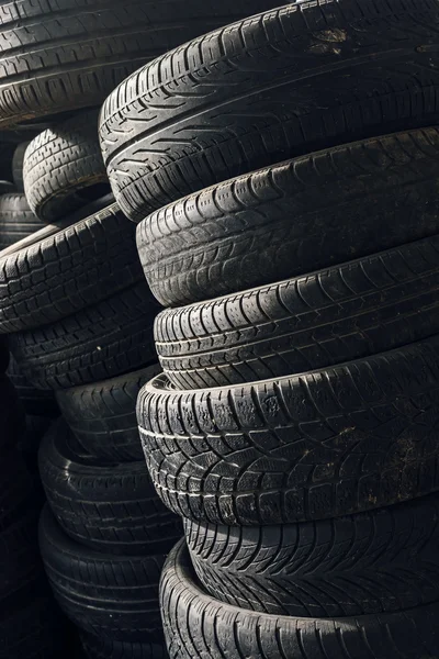 Column stack of old used car tires