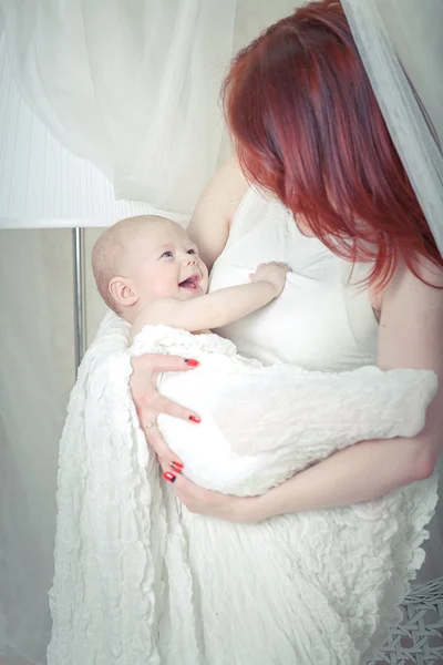 Fun, female, happiness, white, young, beautiful, two, love, parent, family, mother, healthy, woman, boy, cute, life, caucasian, happy, holding, joy, child, playing, care, small, little, innocence, motherhood, son, smiling, tenderness, mom, kid, child