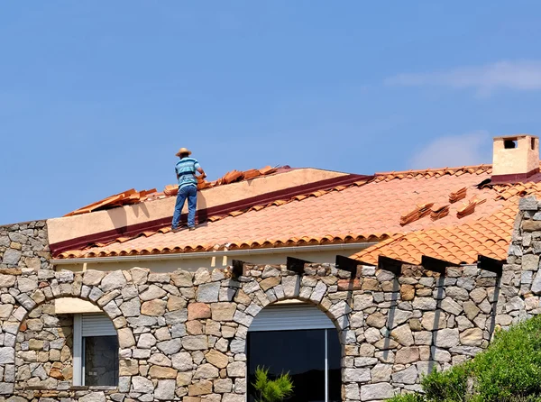 Worker on a roof