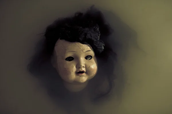 Creepy doll face