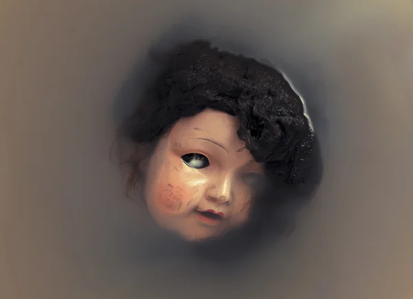 Creepy doll face