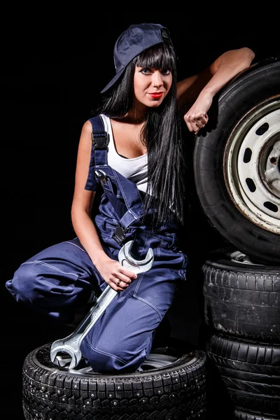 Woman in a tire service