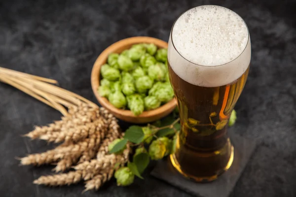 Beer glass on dark background