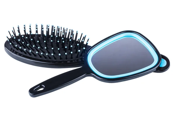 Plastic massage comb and small mirror with handle