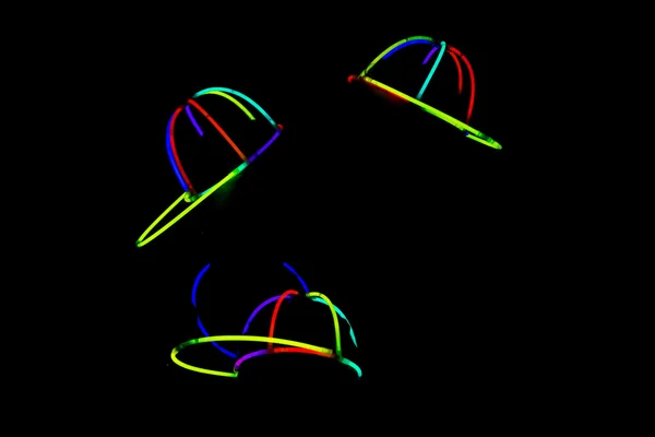 Glowing hats at party