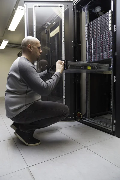 System administrator working on a network server