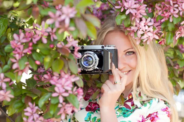 Woman with a retro camera