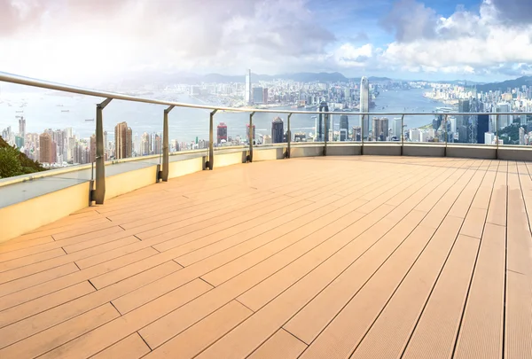Empty floor with cityscape and skyline of Hong Kong