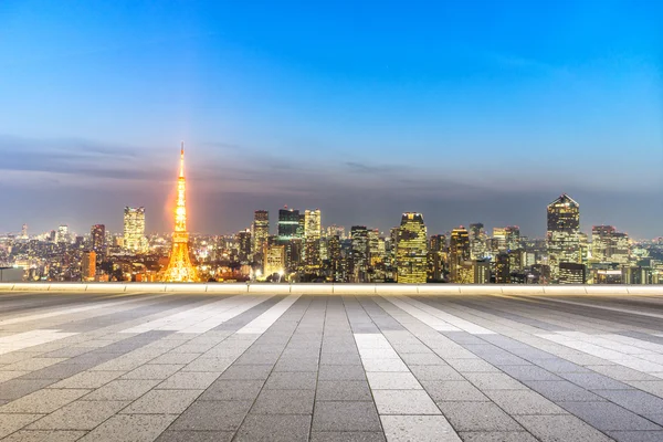 Empty street with cityscape and skyline of Tokyo