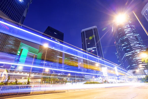 Traffic light trails at modern city street,hongkong.