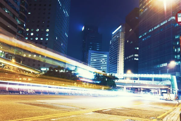 Traffic light trails in modern city