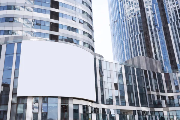 Empty billboard on futuristic office building