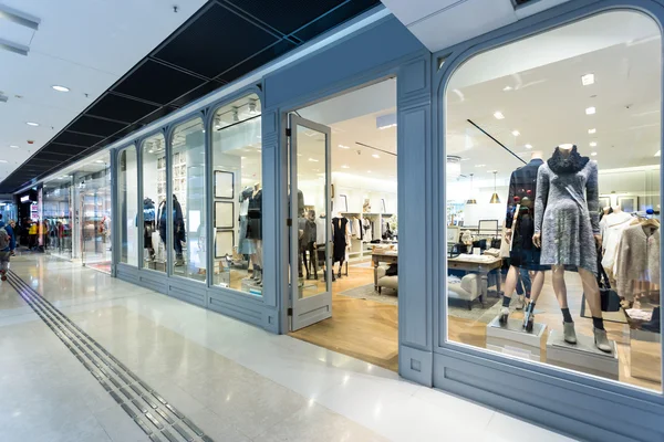 Fashion shop display window and clothes