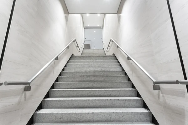 Stairs in building corridor