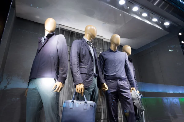 Fashion store mannequins in window