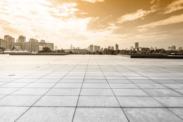 Empty square and floor with sky