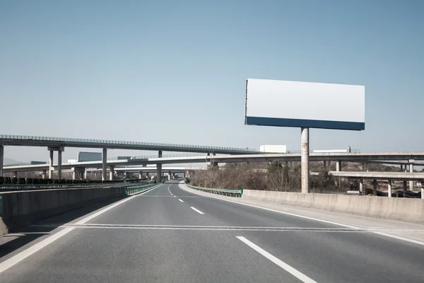 Large billboards near the highway