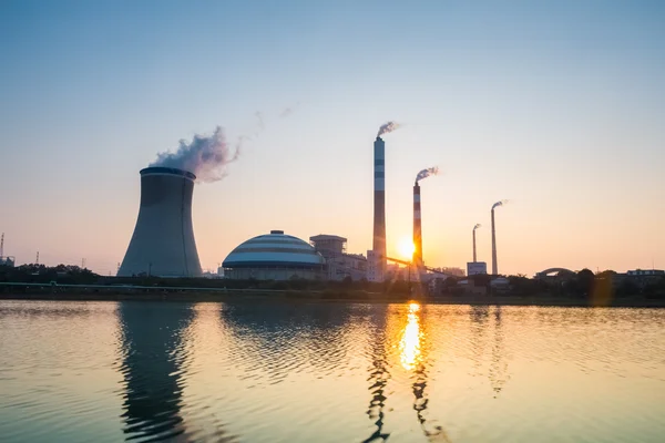 Thermal power plant with the setting sun