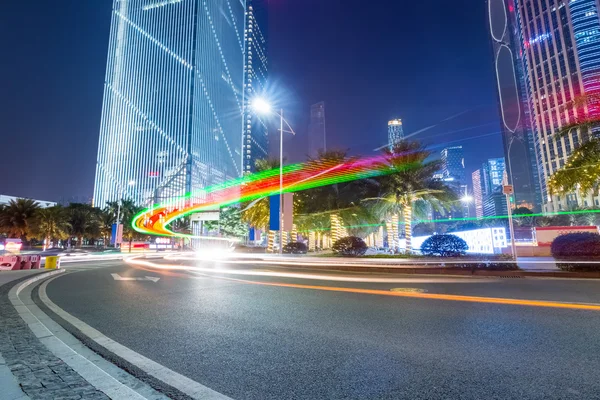 Night scene of road with modern buildings