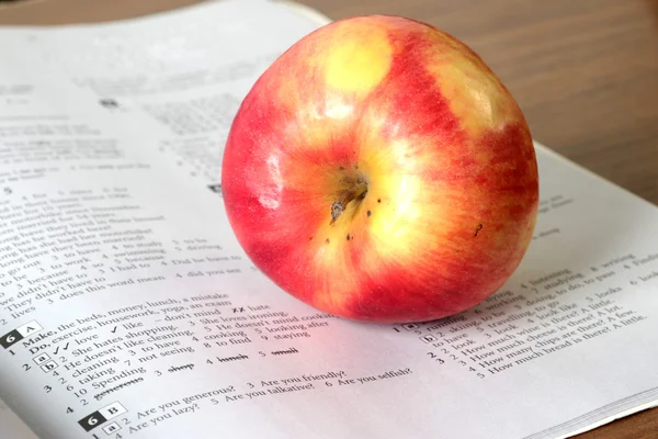 Book and apple