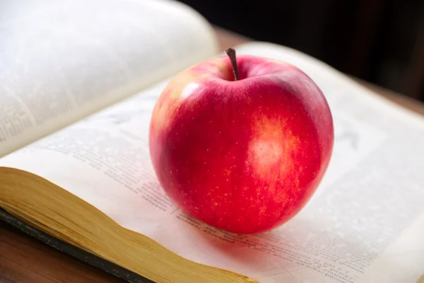 Book and apple