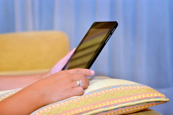 Close up image of woman hands holding tablet device