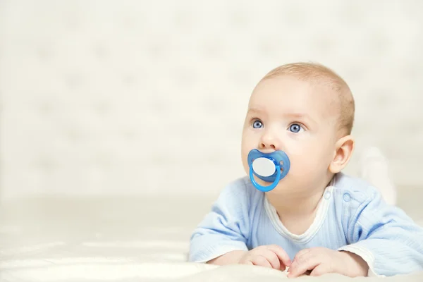 Baby Lying Down on Stomach and Raising Head over White, Kid Boy