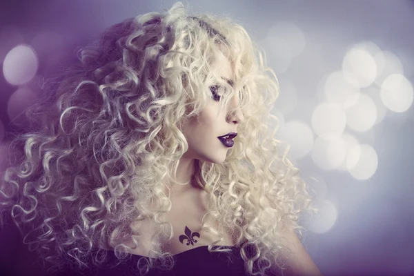 Woman Fashion Beauty Portrait, Model Girl Hairstyle with Blond Curly Hair, Beautiful Makeup, Long Curls and Tattoo