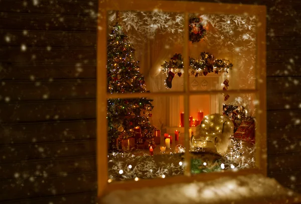 Christmas Window Holiday Home Lights, Room Decorated By Xmas Tree Candles Presents Gift, New Year Night, Snow And Frost
