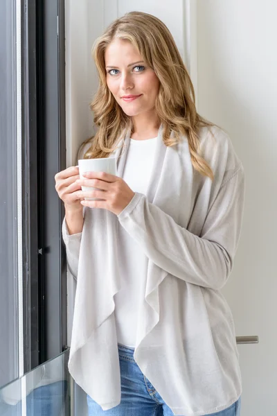 Beautiful woman having a coffee break