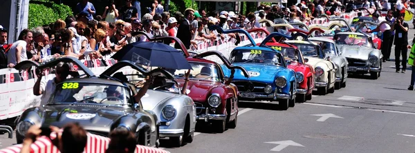 Seven Mercedes Gullwing in a row, and a single Porsche 356, take part to the 1000 Miglia classic car race