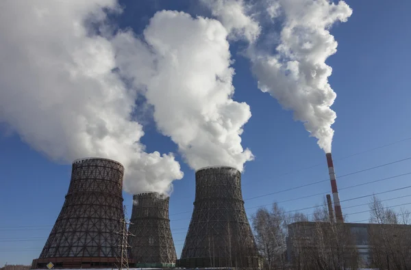Coal power plant against blue sky