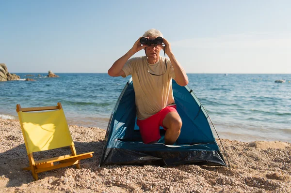 Man camping at the beach