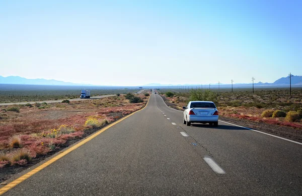 The highway through Arizona desert land