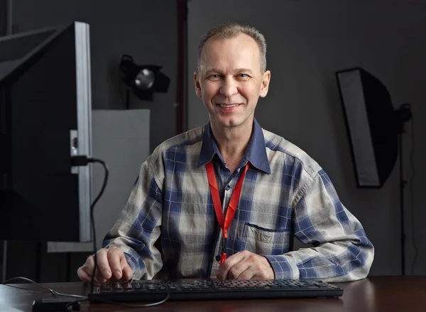 Photographer working on the computer