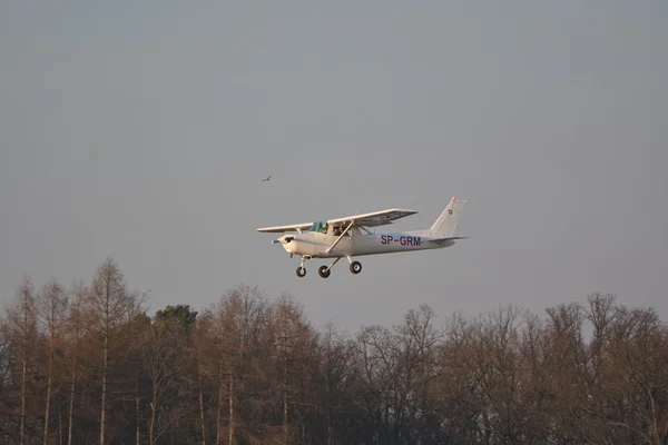Small Cessna plane landing