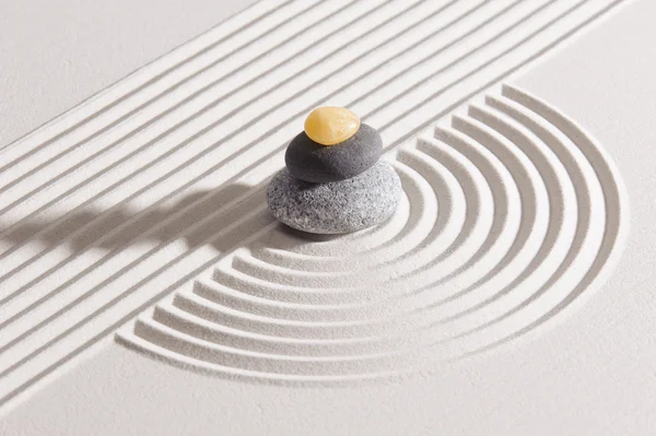 Japanese ZEN garden with raked white sand