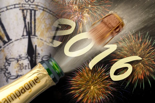 New year 2016 with popping champagne