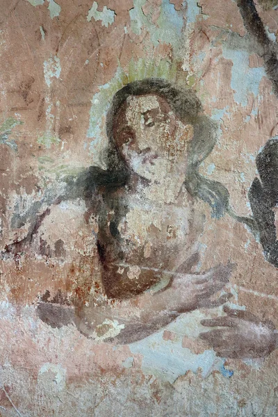 Old mural painting in the ruins of the church