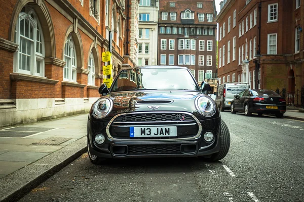 Mini Cooper S parked on the street of London, UK
