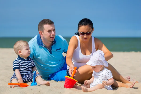 Family with twins on sun holidays