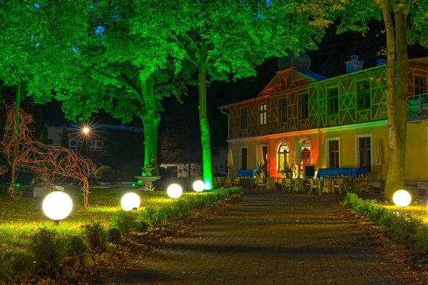 Colorful brick house at night