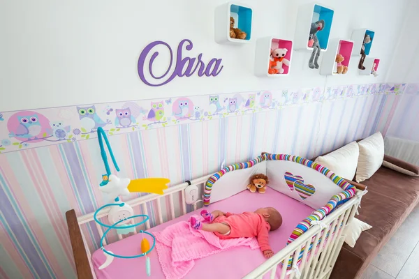 Baby girl cradle in the baby room