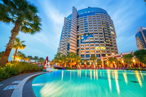 Pool area of resort Khalidiya Palace by Rotana, United Arab Emirates