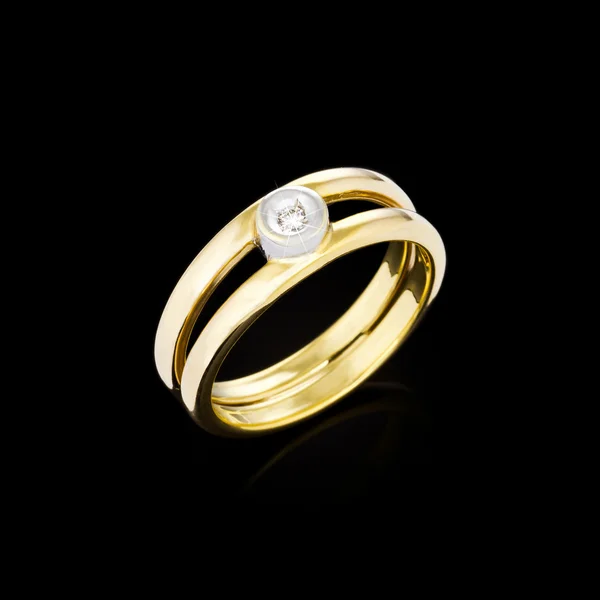 Gold Diamond ring on black background