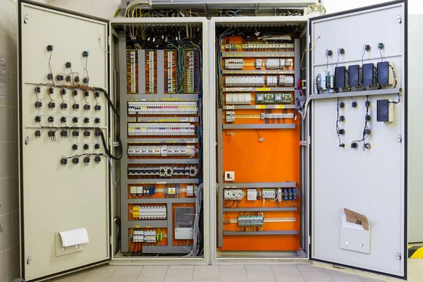 Electricity distribution box with wires, circuit breakers and fu