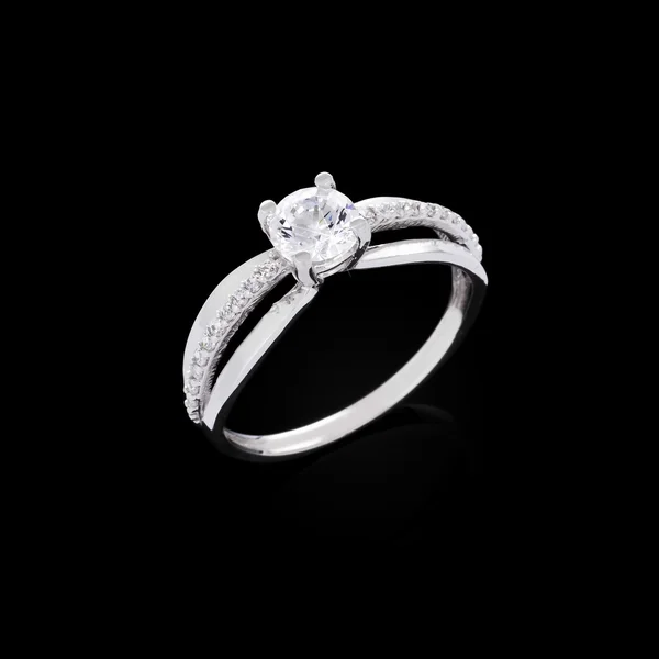 Engagement diamond ring on black background