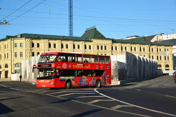 Moscow, Russia -February 18.2016.  two-storey tourist bus City Sightseeing on  street Varvarka