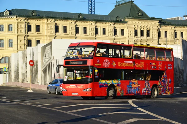 Moscow, Russia -February 18.2016.  two-storey tourist bus City Sightseeing on  street Varvarka