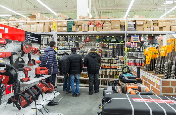 MOSCOW, RUSSIA - MARCH 03, 2015. man makes purchase of Leroy Merlin Store. Leroy Merlin is a French home-improvement and gardening retailer serving thirteen countries